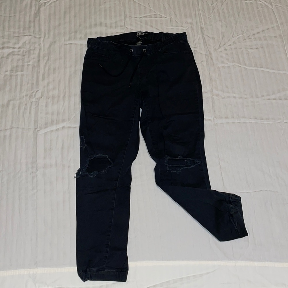 Black, moderately ripped joggers